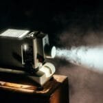 cinema con proiezioni private turned on projector, cinema milano